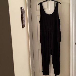 Used Torrid black jersey jumpsuit w/pockets. Sz 4.